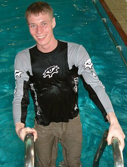 pool lifeguard swimming in uniform clothes